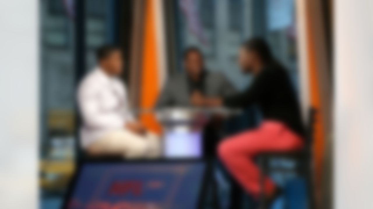 Kony Ealy, LaVar Arrington, and Jadeveon Clowney speak on the NFL AM set on May 7, 2014 in New York, NY. (Ben Liebenberg/NFL)