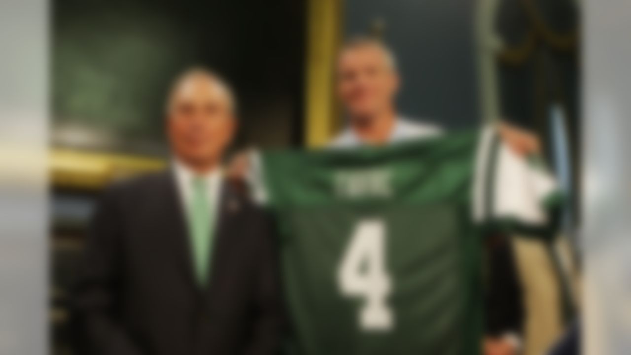 Wearing a New York Titans uniform, New York Jets quarterback Brett