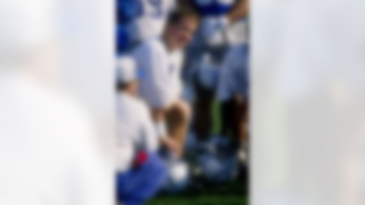 24 Apr 1998: Quarterback Peyton Manning #18 of the Indianapolis Colts looks on during the Colts 1st practice in Indianapolis, Indiana. Photo by Vincent Laforet/Gety Images.