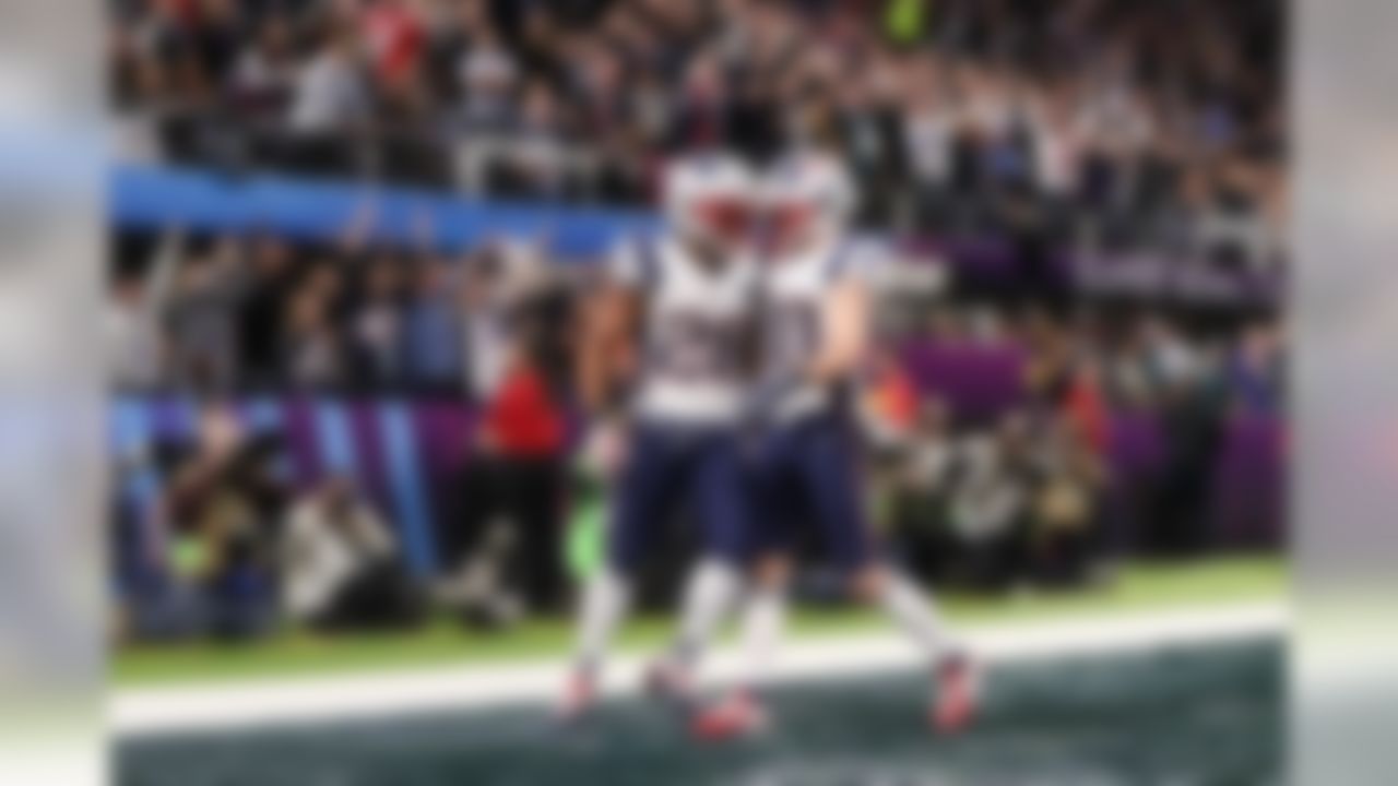 New England Patriots running back James White (28) celebrates with wide receiver Danny Amendola (80) after scoring a touchdown on a 26-yard run.
White joined Roger Craig as the only players in NFL history with multiple rushing TDs and multiple receiving TDs in their Super Bowl careers, per NFL Research.