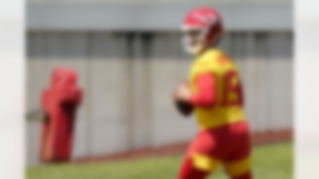 Kansas City Chiefs quarterback Patrick Mahomes looks to throw the ball during NFL football practice, Thursday, June 3, 2021, in Kansas City, Mo.