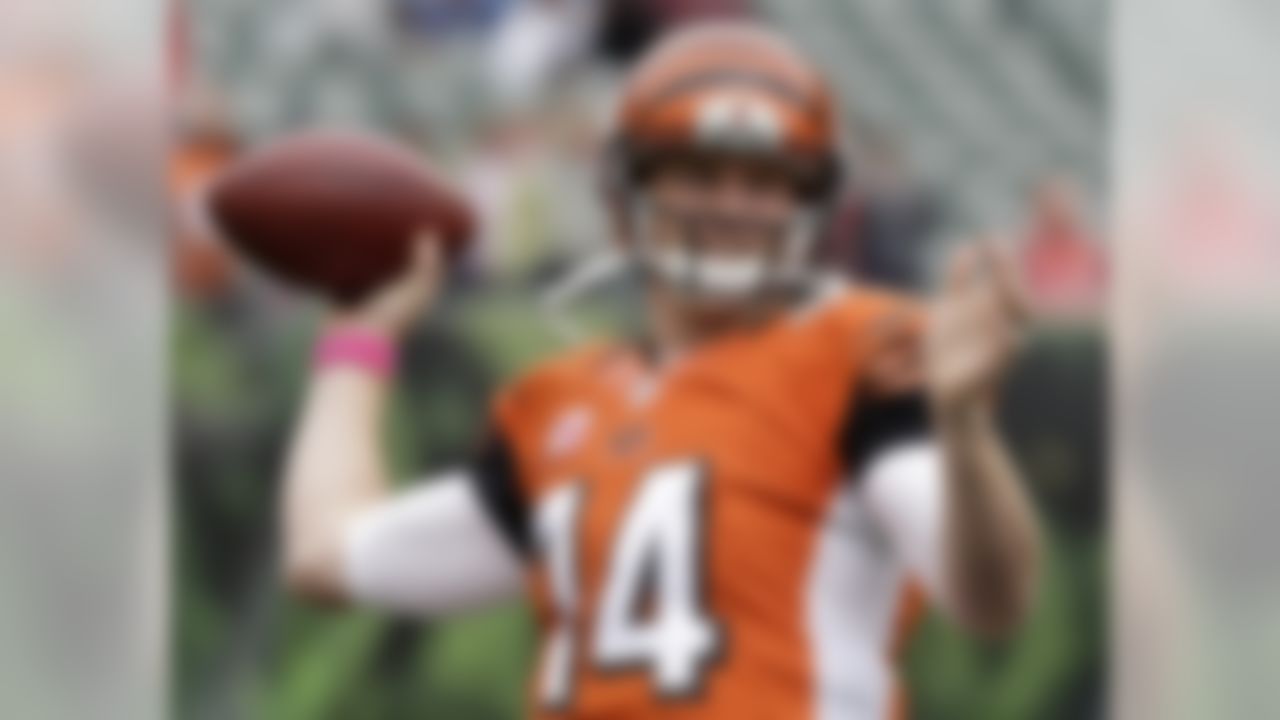 Cincinnati Bengals quarterback Andy Dalton warms up prior to an NFL football game against the Carolina Panthers, Sunday, Oct. 12, 2014, in Cincinnati. (AP Photo/Al Behrman)