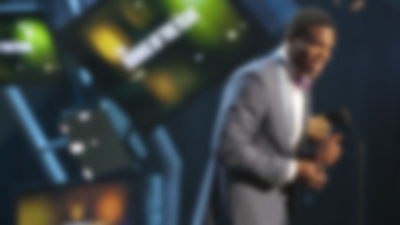 Carolina Panthers' Cam Newton accepts the Rookie of the Year award during the inaugural NFL Honors show Saturday, Feb. 4, 2012, in Indianapolis.