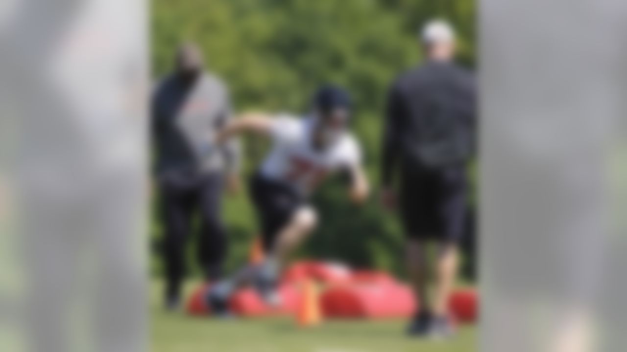 Atlanta Falcons defensive end Kroy Biermann (71) works out during the morning session on the second day of NFL football mini-camp at the team's training complex in Flowery Branch, Ga., Saturday, May 8, 2010. (AP Photo/Paul Abell)