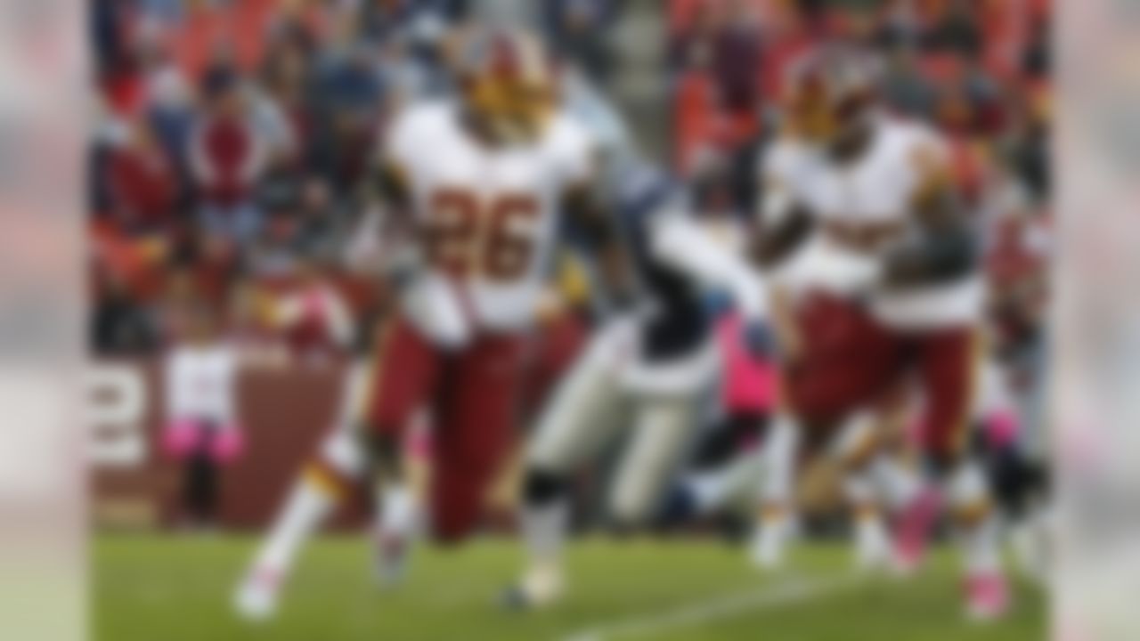 Washington Redskins running back Adrian Peterson (26) carries the ball during the second half of an NFL football game against the Dallas Cowboys, Sunday, Oct. 21, 2018, in Landover, Md. (AP Photo/Alex Brandon)