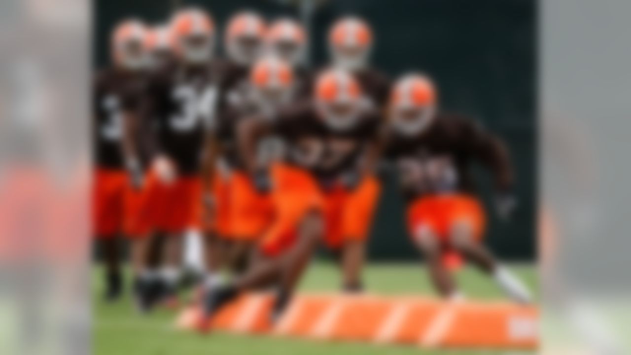 BEREA, OH - MAY 02:  Don Carey #37 and Coye Francies #25 of the Cleveland Browns runs a drill during rookie mini camp at the Cleveland Browns Training and Administrative Complex on May 2, 2009 in Berea, Ohio.  (Photo by Gregory Shamus/Getty Images)