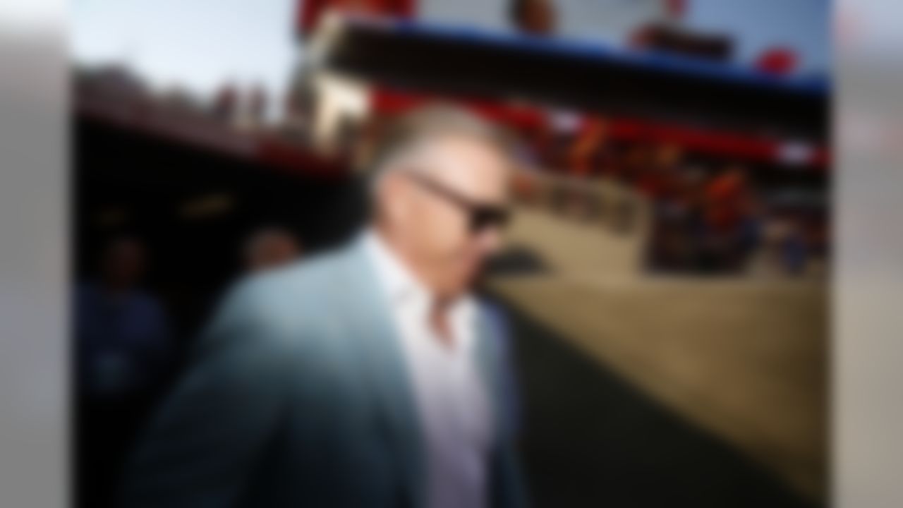 John Elway walks onto the field during an NFL preseason football game, Saturday, Aug. 19, 2017, in Santa Clara, Calif. The Broncos defeated the 49ers 33-14. (Ryan Kang/NFL)