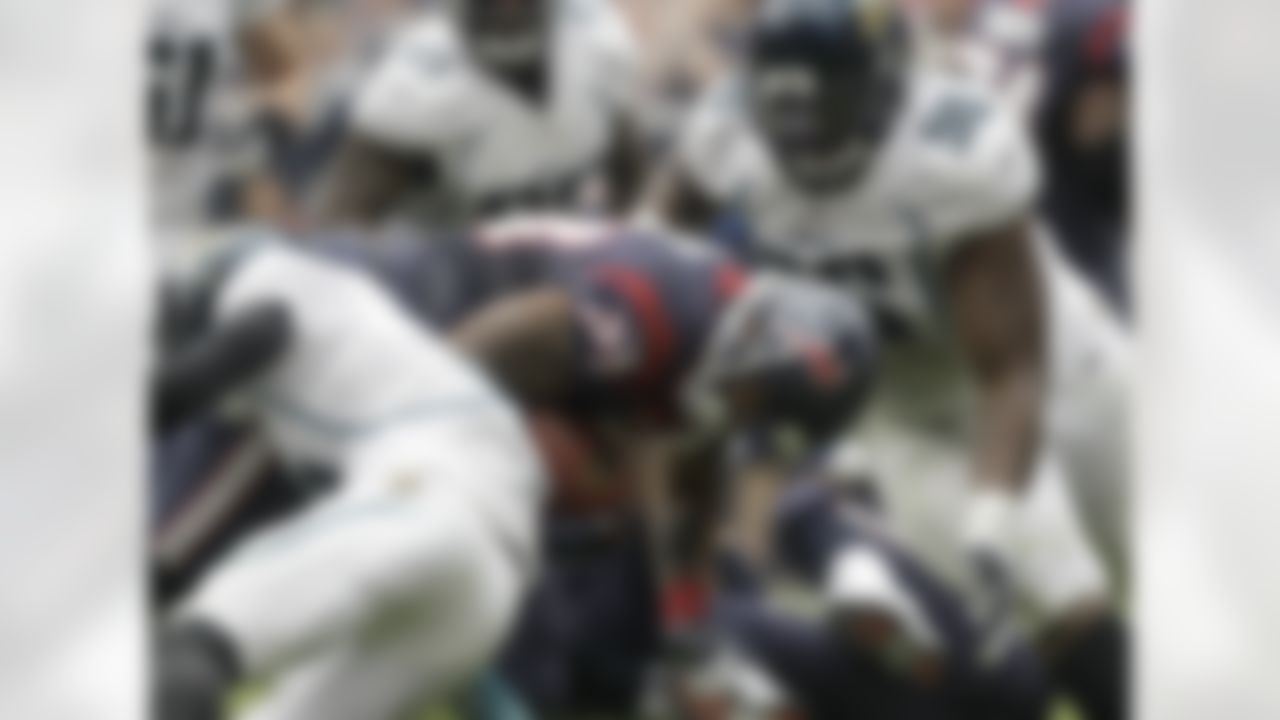 Houston Texans running back Arian Foster (23) runs for a first down during the second quarter of an NFL football game against the Jacksonville Jaguars on Sunday, Nov. 18, 2012, in Houston. (AP Photo/Patric Schneider)