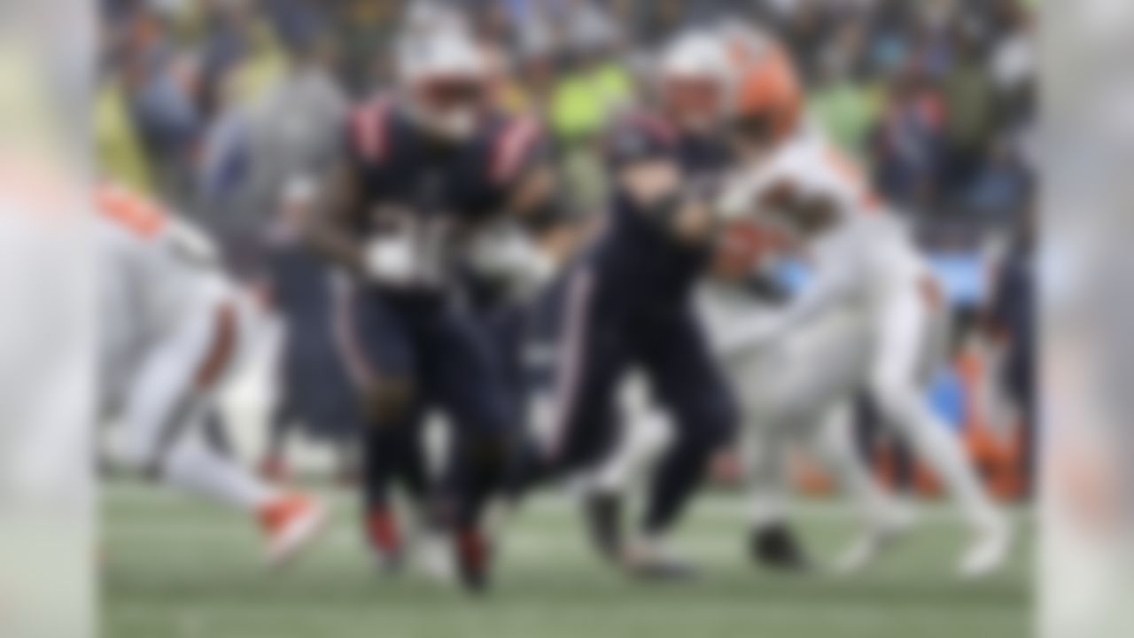 New England Patriots running back Sony Michel, left, carries against the Cleveland Browns in the first half of an NFL football game, Sunday, Oct. 27, 2019, in Foxborough, Mass. (AP Photo/Steven Senne)