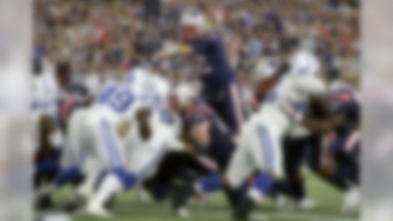 New England Patriots quarterback Tom Brady leaps over the line of scrimmage for a touchdown against the Indianapolis Colts during the first half of an NFL football game, Thursday, Oct. 4, 2018, in Foxborough, Mass. (AP Photo/Steven Senne)