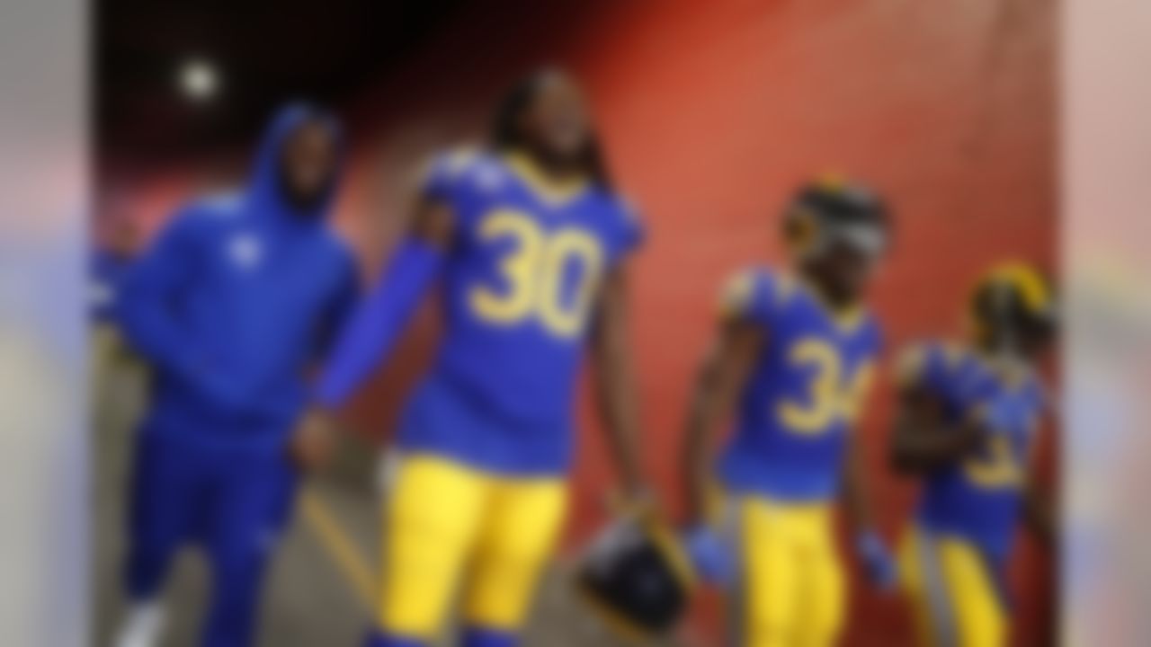 Los Angeles Rams running back Todd Gurley (30), running back Malcolm Brown (34), and running back Justin Davis (33) walk onto the field prior to an NFL football game against the Minnesota Vikings, Thursday, Sept. 27, 2018 in Los Angeles. (Ryan Kang/NFL)