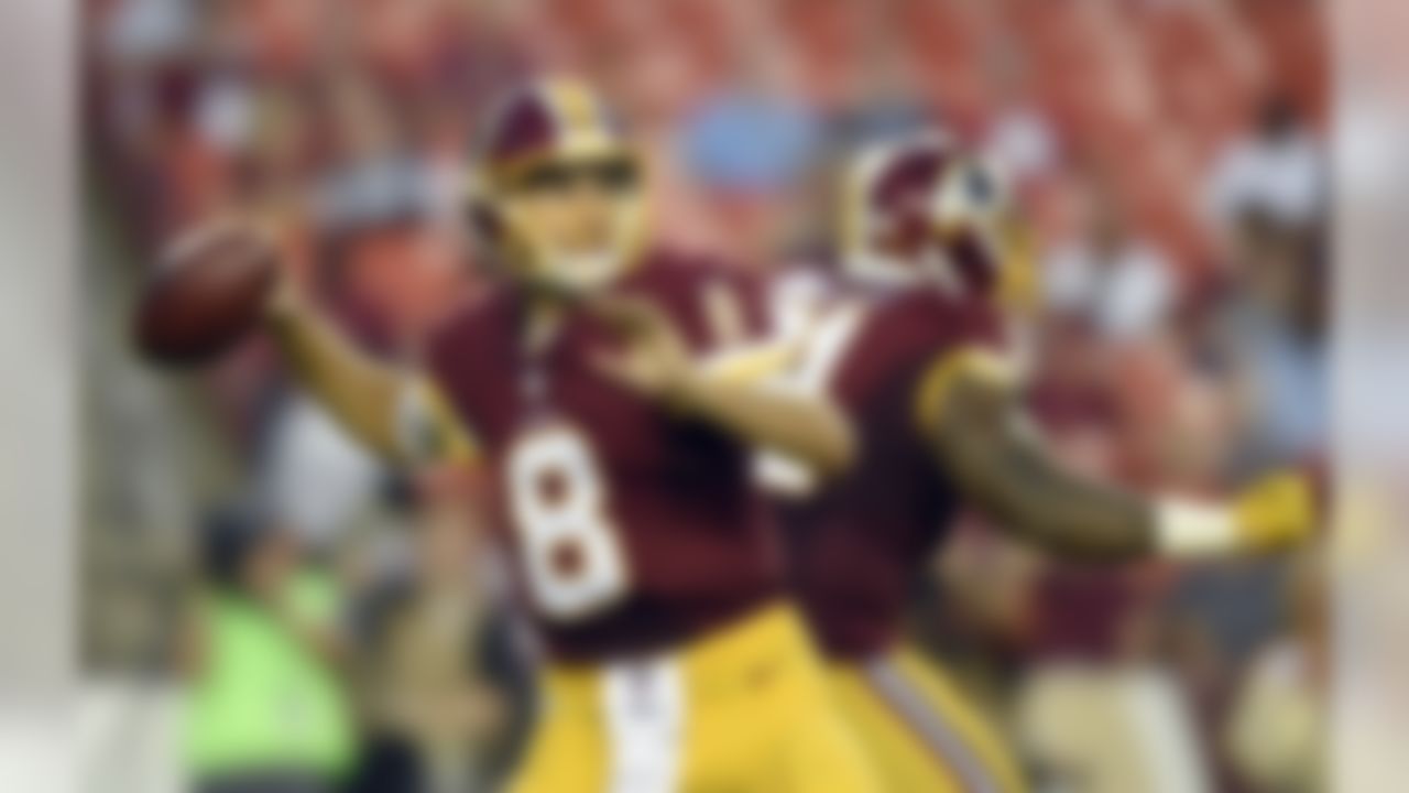 Washington Redskins quarterback Kirk Cousins (8) looks to pass during the first half of an NFL preseason football game against the Buffalo Bills, Friday, Aug. 26, 2016, in Landover, Md. (AP Photo/Nick Wass)