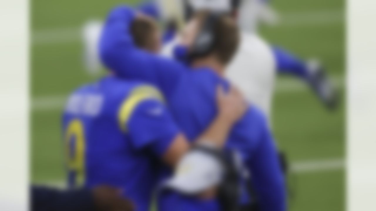 Los Angeles Rams quarterback John Wolford (9) celebrates with head coach Sean McVay during an NFL football game against the Arizona Cardinals on Sunday, January 3, 2021 in Inglewood, California.