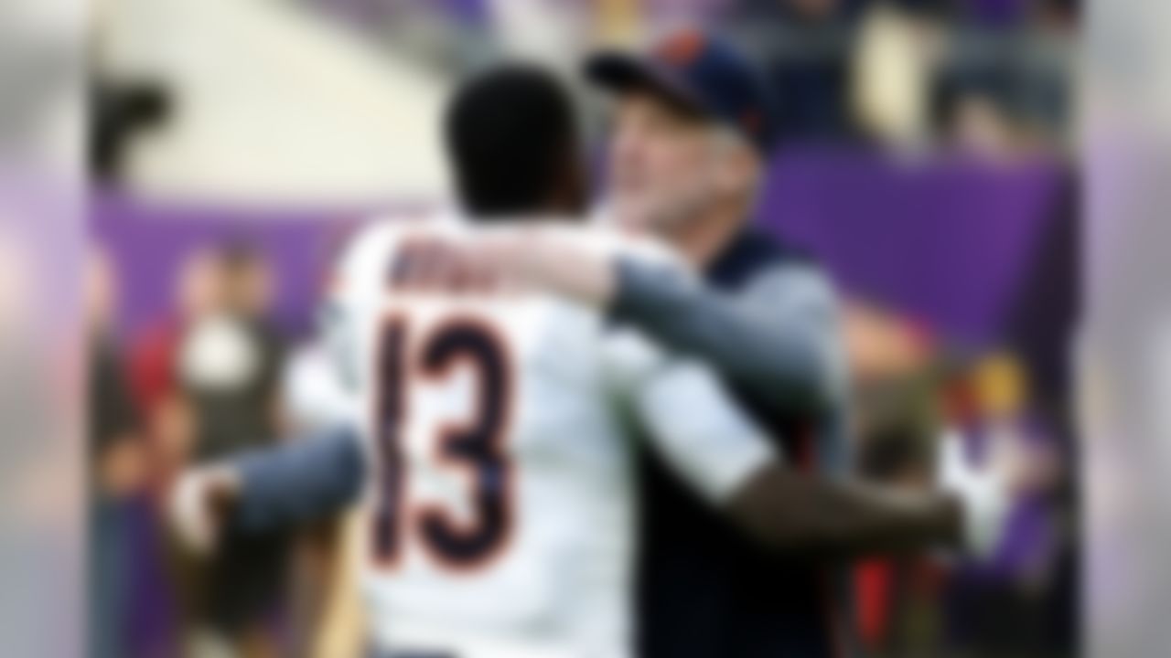 Chicago Bears head coach John Fox hugs wide receiver Kendall Wright (13) before an NFL football game against the Minnesota Vikings, Sunday, Dec. 31, 2017, in Minneapolis. (AP Photo/Bruce Kluckhohn)