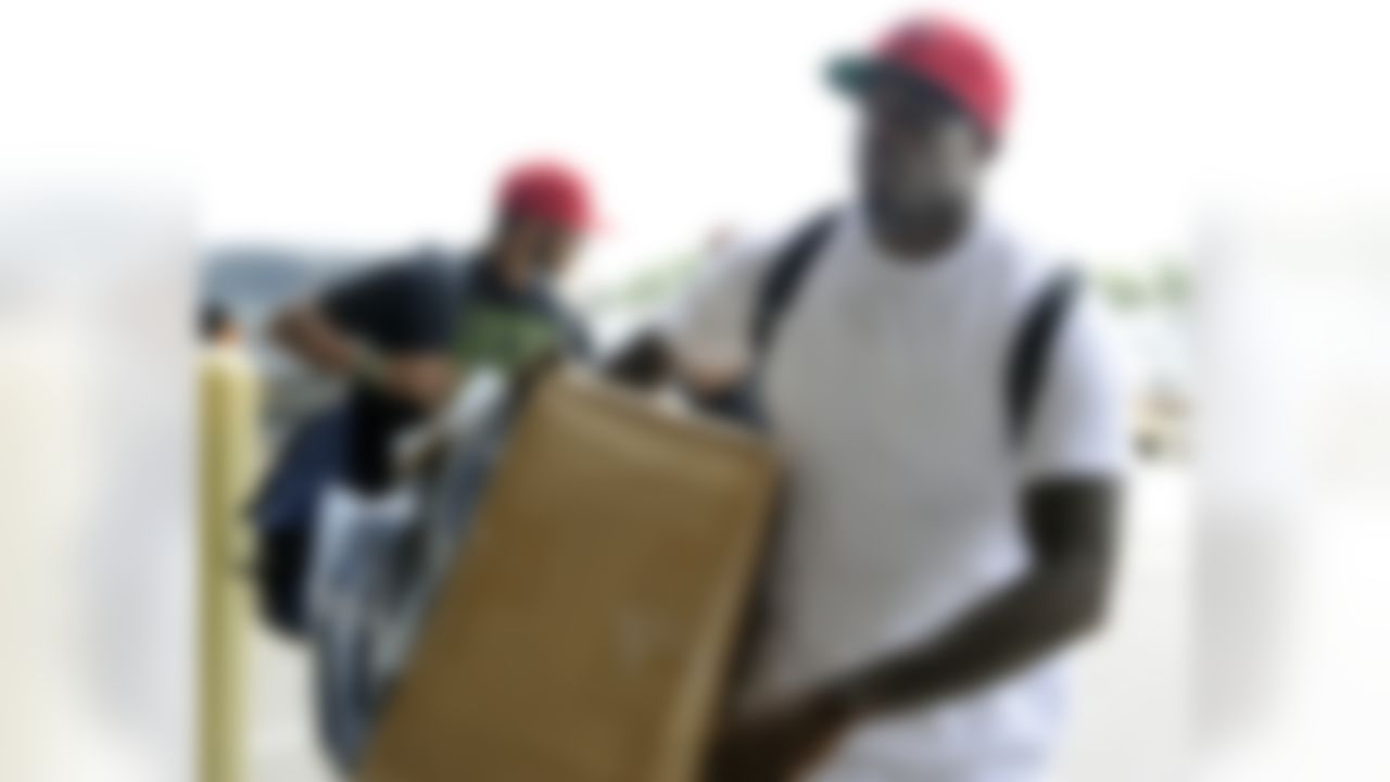 Houston Texans football wide receiver Andre Johnson arrives to report for NFL football training camp Friday, July 27, 2012, in Houston. (AP Photo/Pat Sullivan)