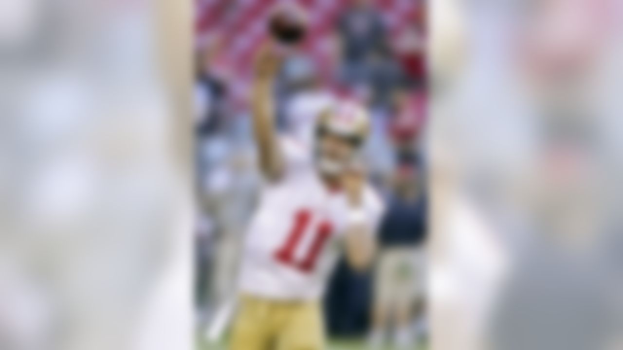 San Francisco 49ers quarterback Alex Smith (11) warms up prior to an NFL football game against the Arizona Cardinals, Monday, Oct. 29, 2012, in Glendale, Ariz. (AP Photo/Paul Connors)