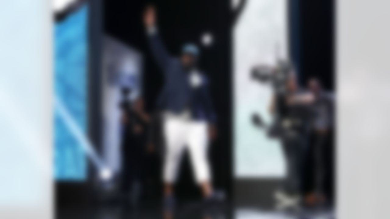 Alabama defensive tackle A'Shawn Robinson walks onto the stage after being selected by the Detroit Lions during the 2016 NFL Draft at the Auditorium Theatre on Friday, April 29, 2016 in Chicago. (Ben Liebenberg/NFL)