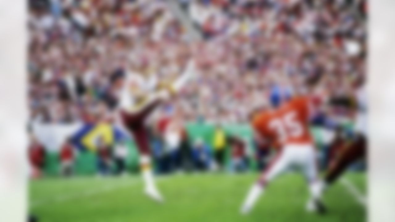 Washington Redskins punter Steve Cox (12) punts the ball during Super Bowl XXII, a 42-10 victory over the Denver Broncos on January 31, 1988, at Jack Murphy Stadium in San Diego, CA. (National Football League)