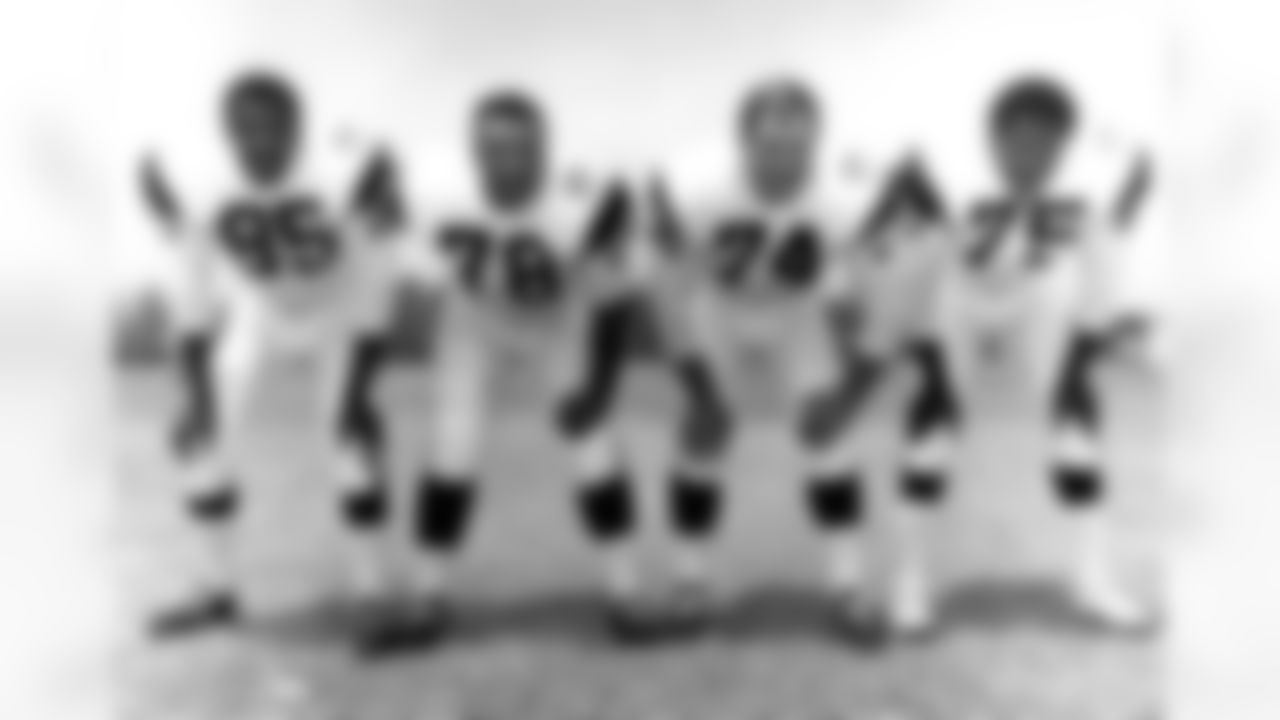 The Los Angeles Rams defensive front four, the second "Fearsome Foursome", pose together in 1969. Pictured left to right are defensive end Lamar Lundy (85), defensive tackle Roger Brown (78), Hall of Fame defensive tackle Merlin Olsen (74), and Hall of Famer Deacon Jones. (National Football League)