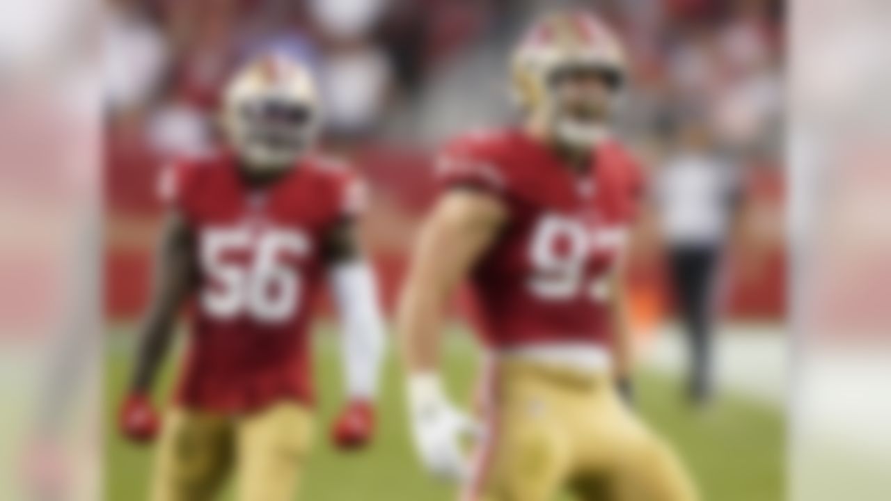 San Francisco 49ers defensive end Nick Bosa (97) celebrates in front of middle linebacker Kwon Alexander (56) during the first half of an NFL football game against the Cleveland Browns in Santa Clara, Calif., Monday, Oct. 7, 2019.