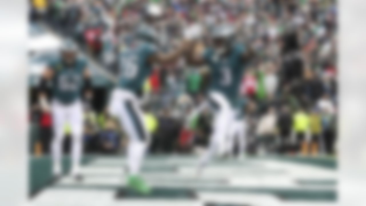 Philadelphia Eagles running back Miles Sanders (26) and wide receiver Zach Pascal (3) celebrate a touchdown during an NFL Conference Championship playoff game against the San Francisco 49ers on Sunday, January 29, 2023 in Philadelphia, Pennsylvania.