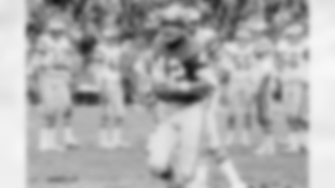 Washington Redskins' Charley Taylor (42) is shown after he caught his 634th reception to top Don Maynard's mark of 633, in the fourth quarter in Washington on Dec. 21, 1975. (Associated Press)