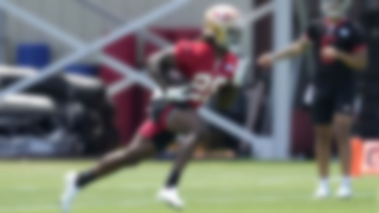 San Francisco 49ers rookie quarterback Trey Lance, right, and running back Trey Sermon, left, run drills during NFL football rookie minicamp in Santa Clara, Calif., Friday, May 14, 2021.