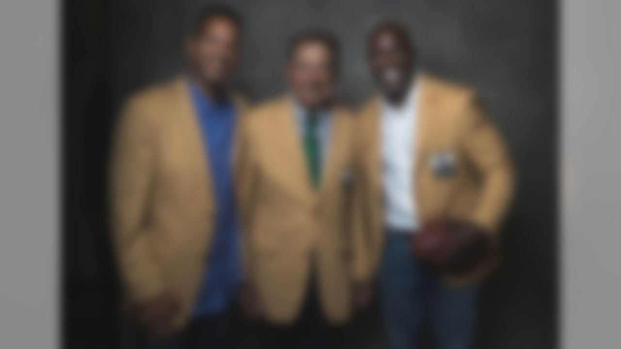 Hall of Famers Andre Reed, Joe Namath and Terrell Davis pose for a photo at the Pro Football Hall of Fame on Friday, August. 2, 2019 in Canton, Ohio.