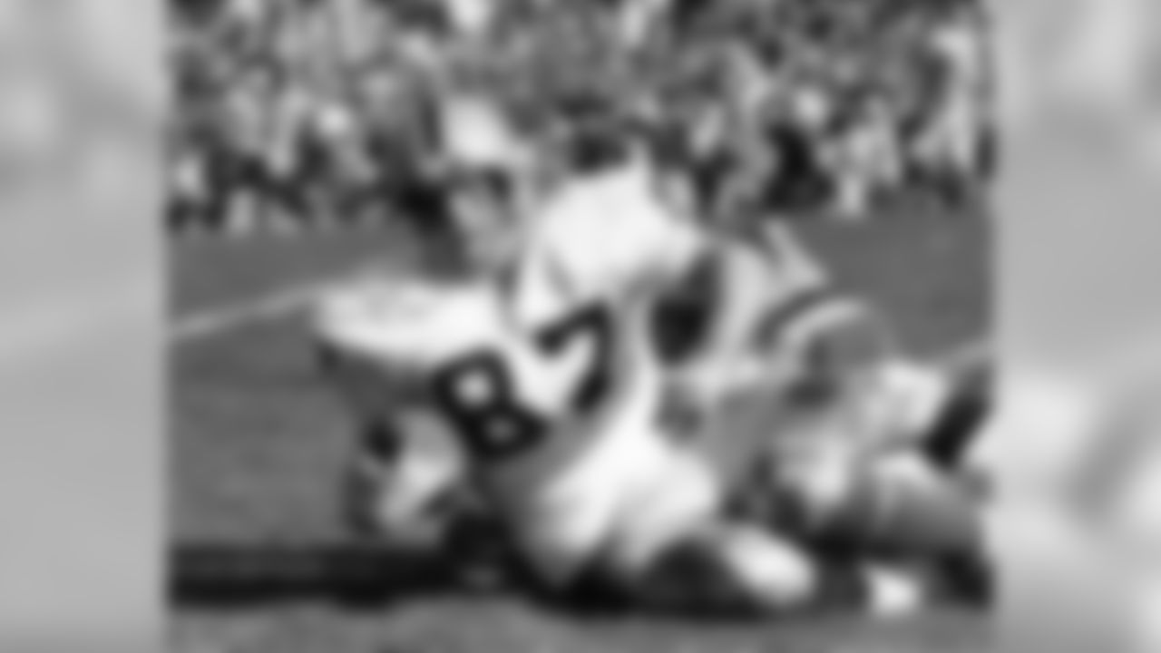 Oakland Raiders tight end Dave Casper is brought down after making a reception against the Minnesota Vikings during Super Bowl XI in Pasadena, Calif., Jan. 9, 1977. Raiders defeated the Vikings, 32-14. (National Football League)