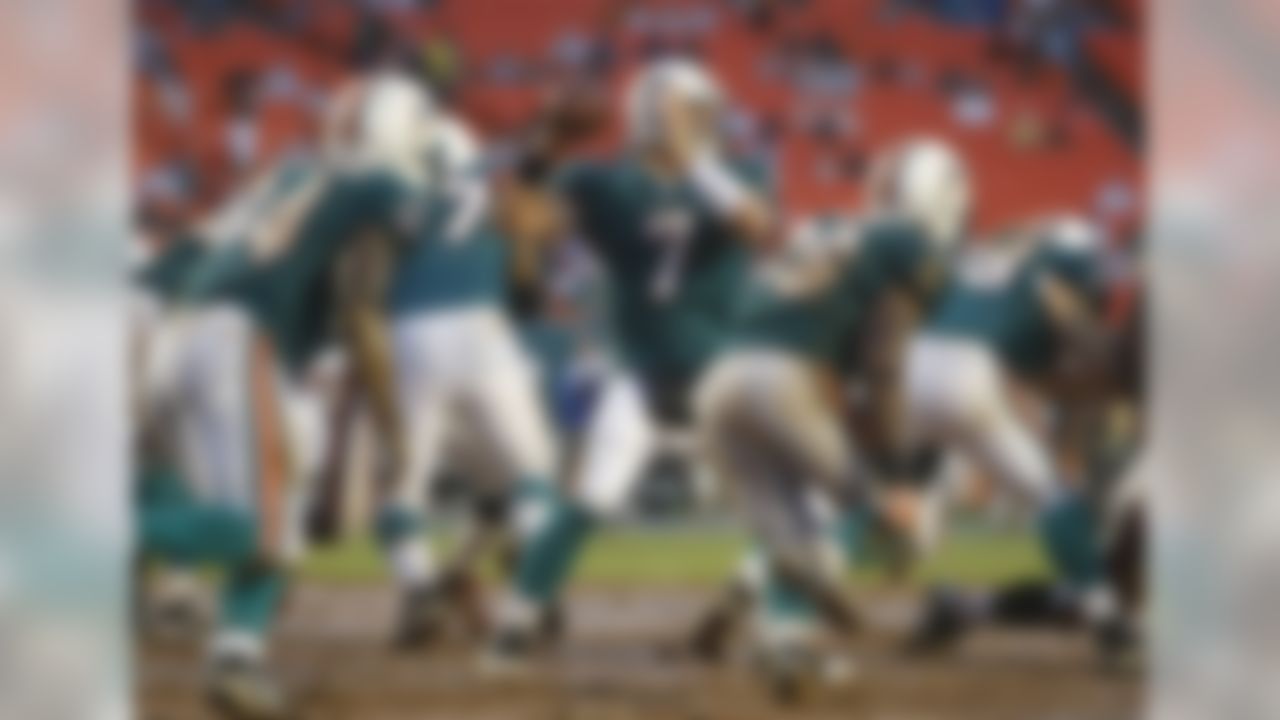 Miami Dolphins quarterback Chad Henne (7) stands back to pass in the first quarter an NFL preseason football game against the Tampa Bay Buccaneers in Miami, Saturday, Aug. 14, 2010. (AP Photo/J. Pat Carter)