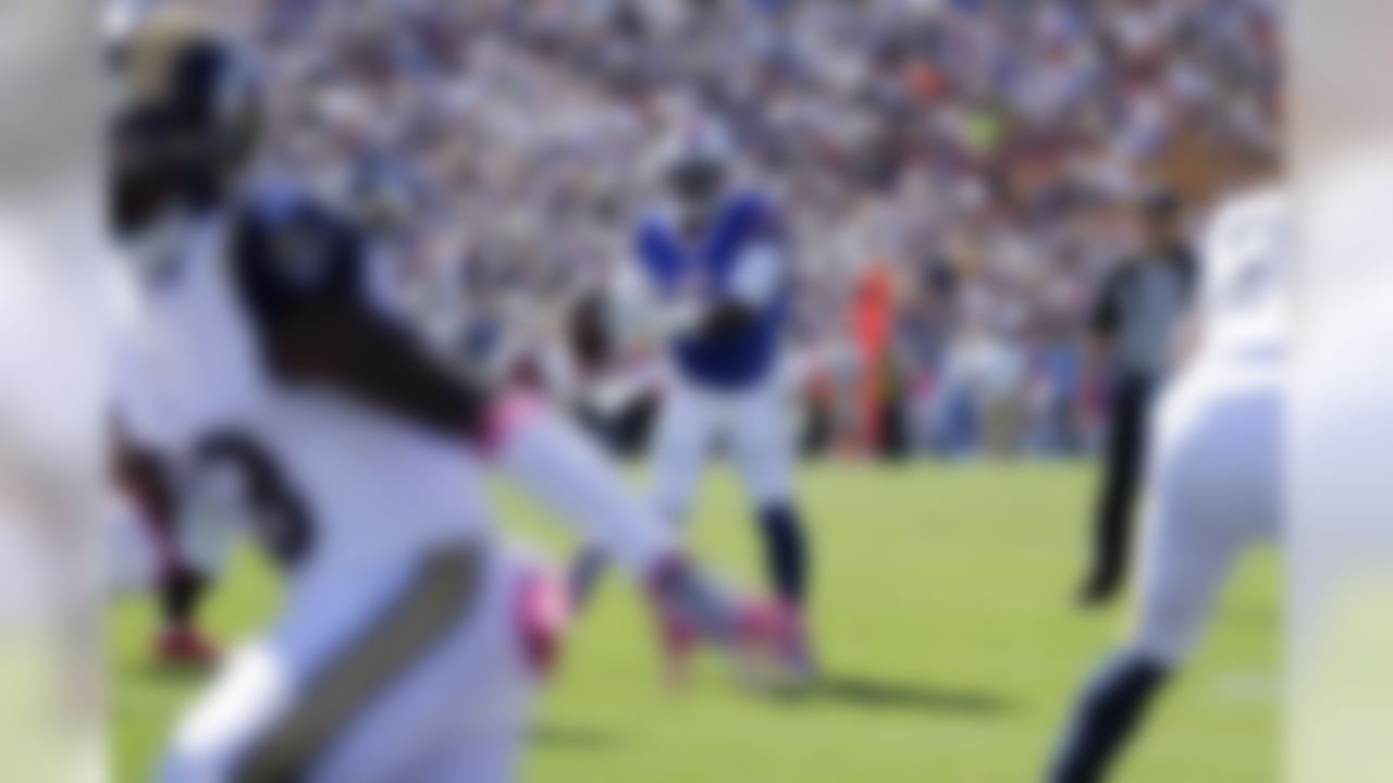 Buffalo Bills quarterback Tyrod Taylor, center, looks to pass during the first half of an NFL football game against the Los Angeles Rams, Sunday, Oct. 9, 2016, in Los Angeles. (AP Photo/Jae C. Hong)