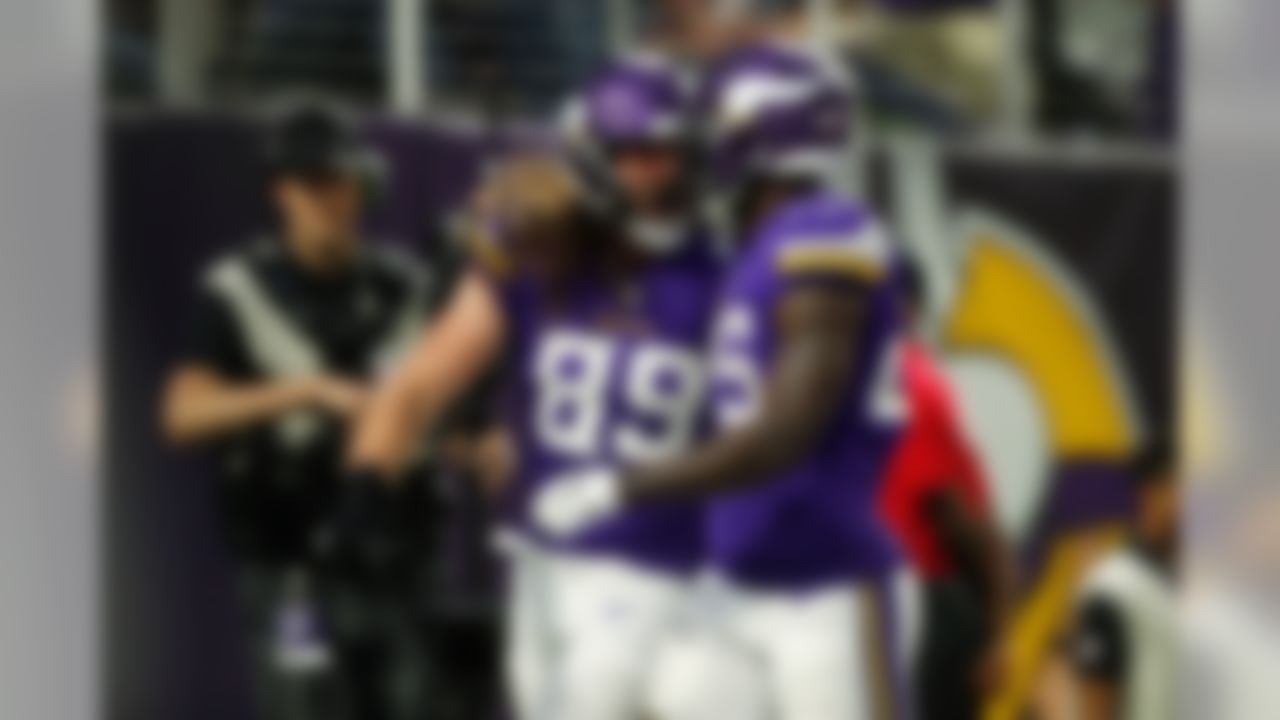 Minnesota Vikings tight end David Morgan (89) celebrates with Minnesota Vikings running back Latavius Murray (25) during an NFL preseason football game against the Seattle Seahawks on Aug. 24, 2018 in Minneapolis.