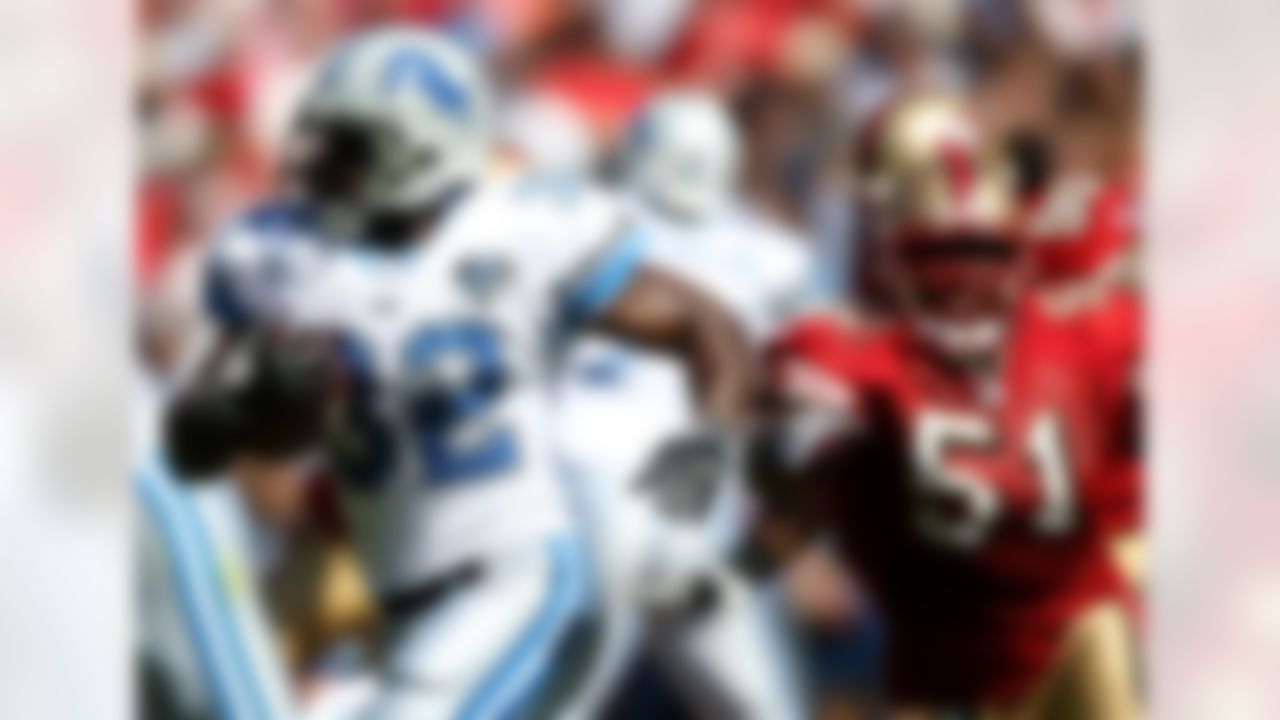 SAN FRANCISCO - SEPTEMBER 21: Rudi Johnson #32 of the Detroit Lions runs against Takeo Spikes #51 of the San Francisco 49ers during an NFL game on September 21, 2008 at Candlestick Park in San Francisco, California. (Photo by Jed Jacobsohn/Getty Images)