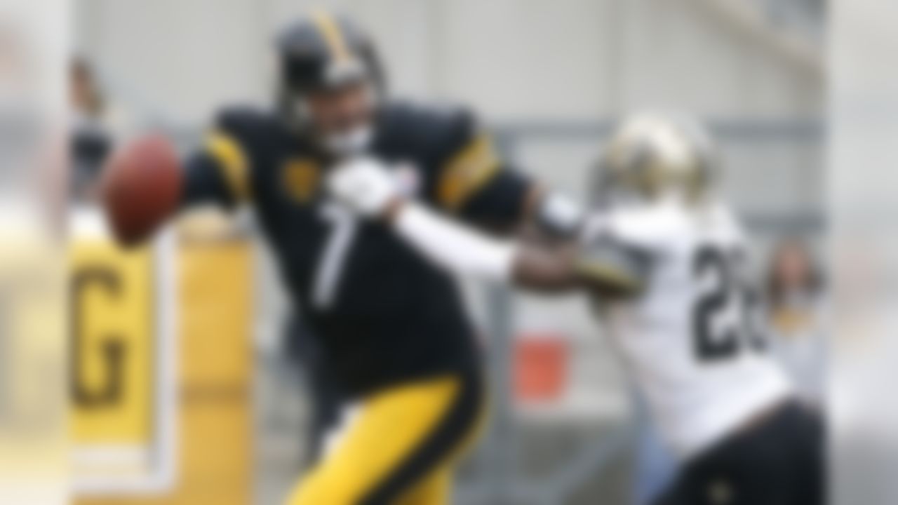 Pittsburgh Steelers quarterback Ben Roethlisberger (7) scrambles away from New Orleans Saints cornerback Keenan Lewis (28) in the first quarter of an NFL football game Sunday, Nov. 30, 2014, in Pittsburgh. (AP Photo/Gene J. Puskar)