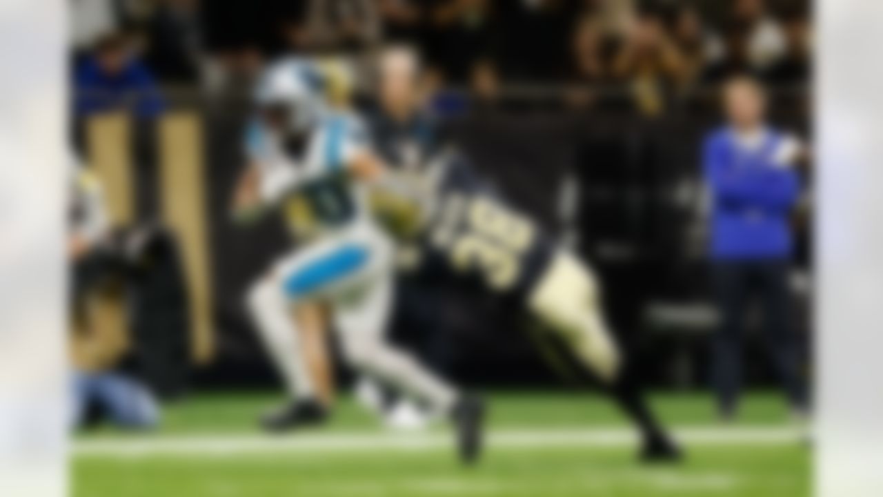 Carolina Panthers running back Chuba Hubbard (30) runs the ball during an NFL football game against the New Orleans Saints on Sunday, January 2, 2022 in New Orleans, Louisiana.
