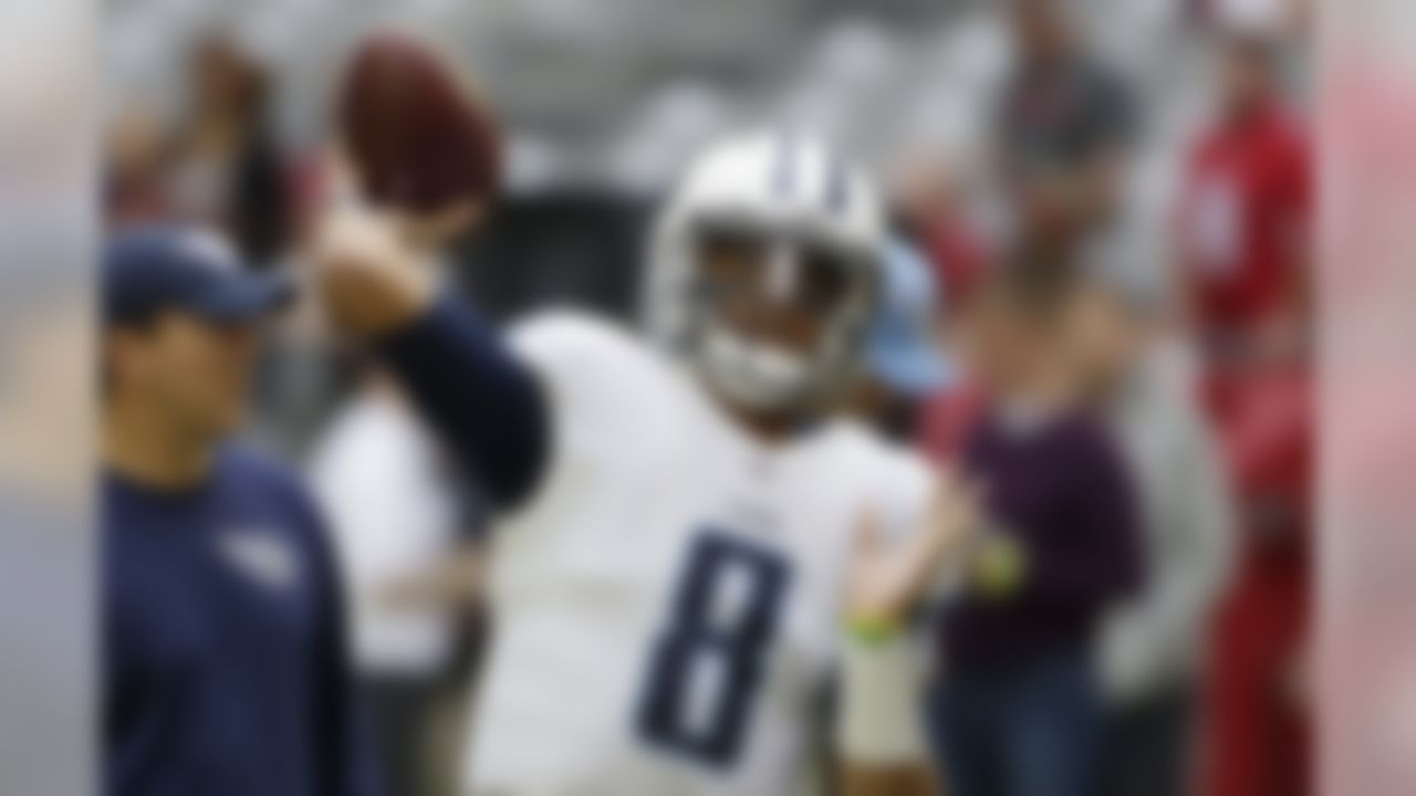 Tennessee Titans quarterback Marcus Mariota warms up prior to an NFL football game against the Arizona Cardinals, Sunday, Dec. 10, 2017, in Glendale, Ariz. (AP Photo/Rick Scuteri)