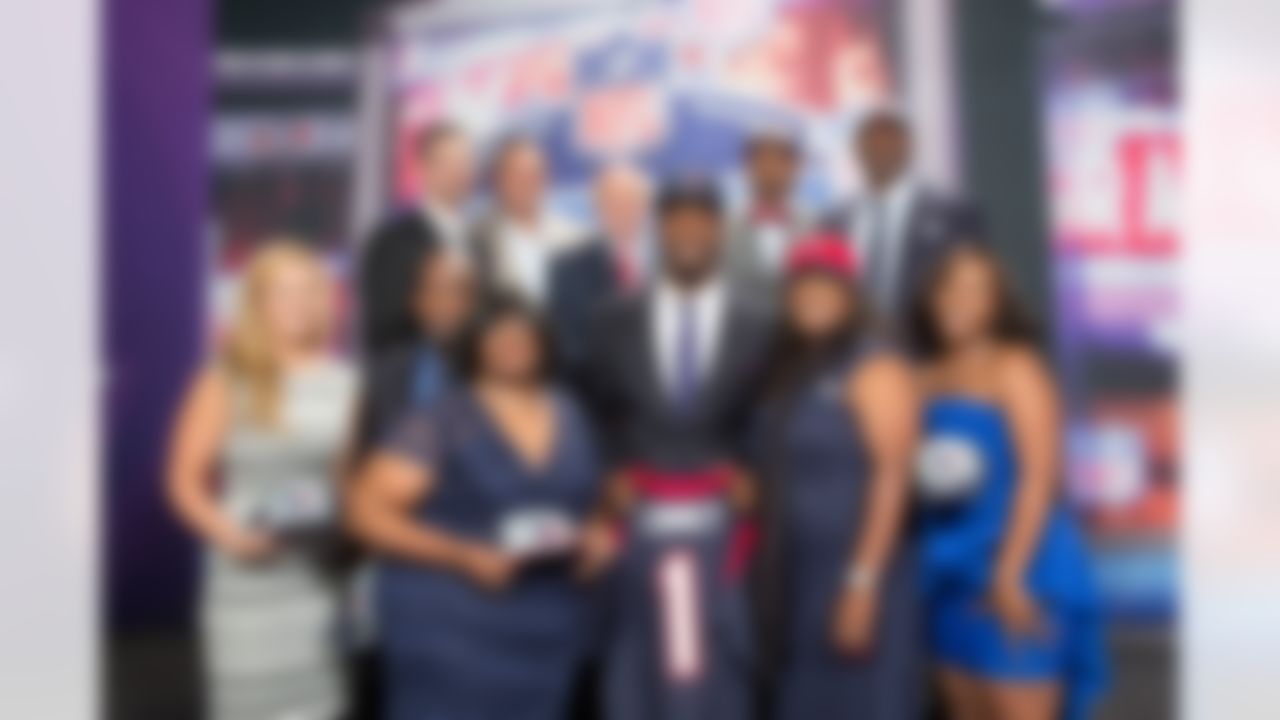 Jadeveon Clowney, center, poses with his family after being selected by the Houston Texans during the 2014 NFL Draft at Radio City Music Hall on May 8, 2014 in New York, NY. (Allison Harrell/NFL)