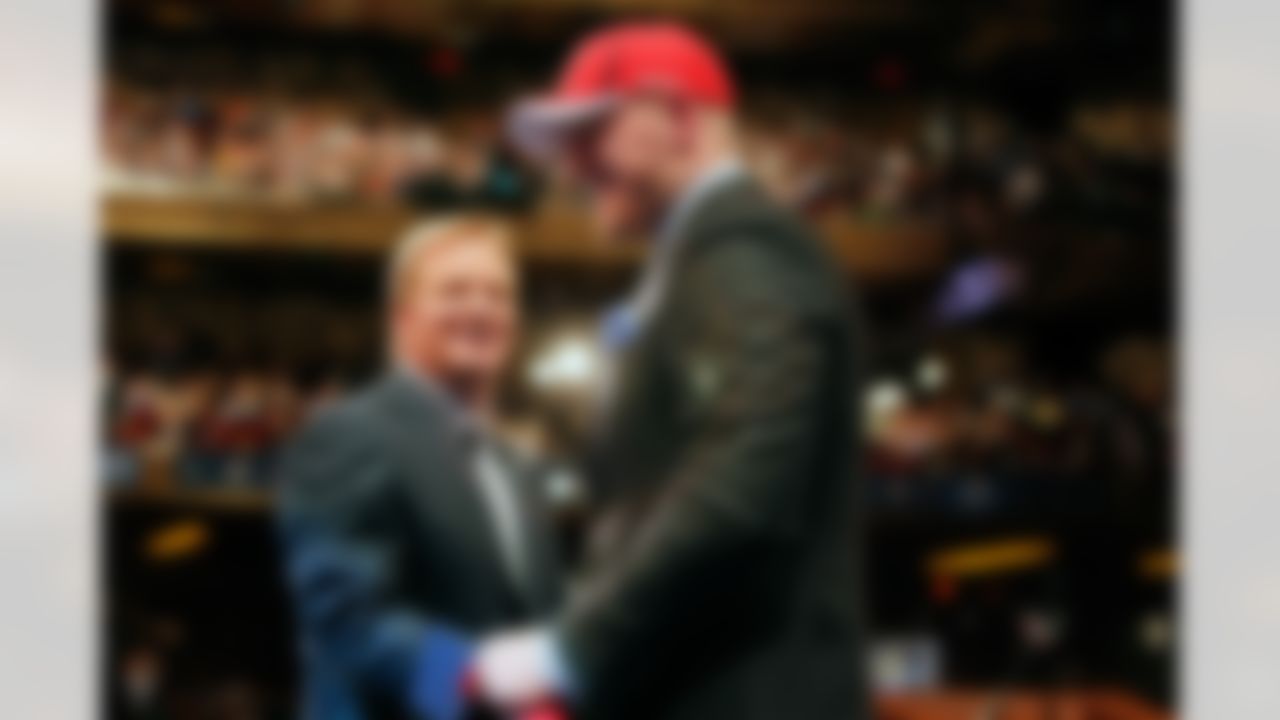 J.J. Watt with Commissioner Roger Goodell after being selected by the Houston Texans during the 2011 NFL Draft at Radio City Music Hall on April 28, 2011 in New York, NY. (AP Photo/Ben Liebenberg)
