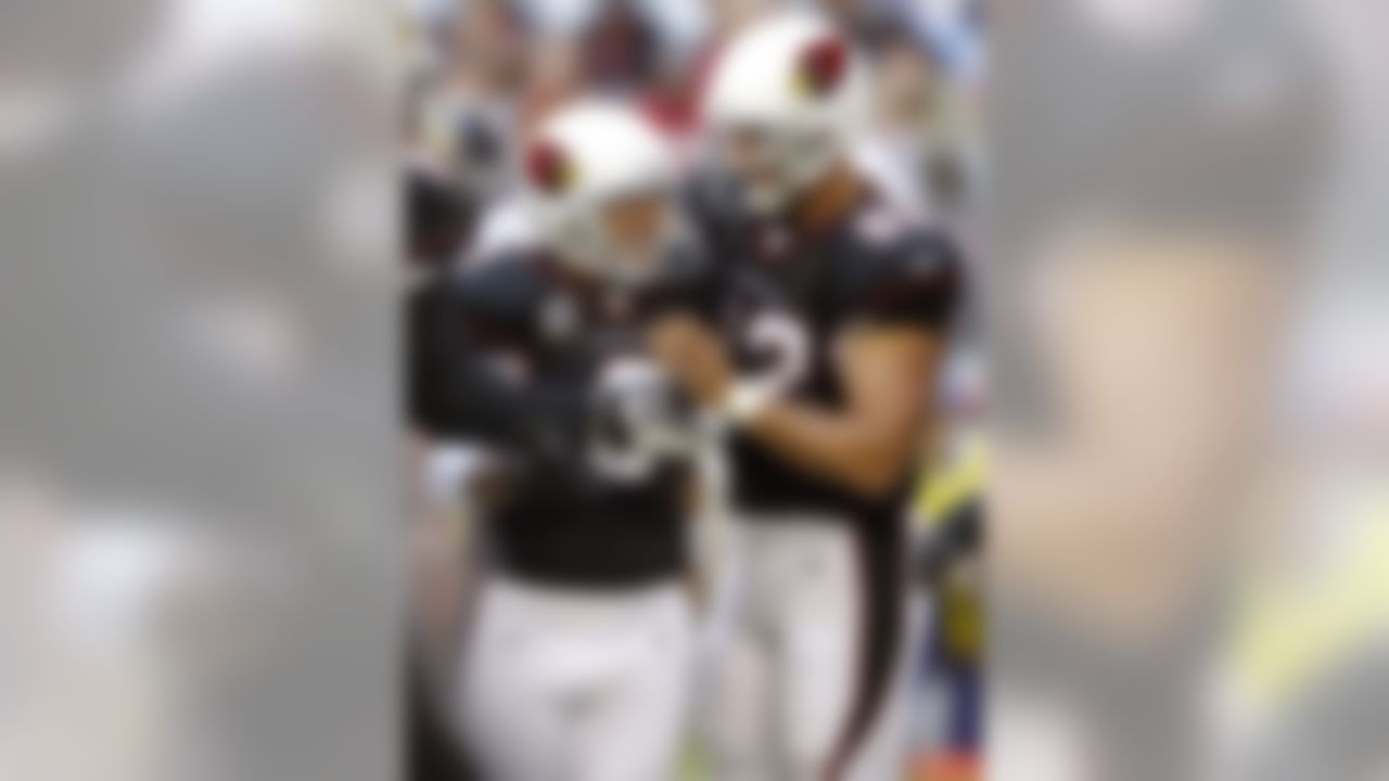 Arizona Cardinals kicker Jay Feely (3) celebrates his field goal with teammate  Mike Leach (82) during the first quarter of an NFL football game against the St. Louis Rams Sunday, Nov. 6, 2011, in Glendale, Ariz. (AP Photo/Paul Connors)