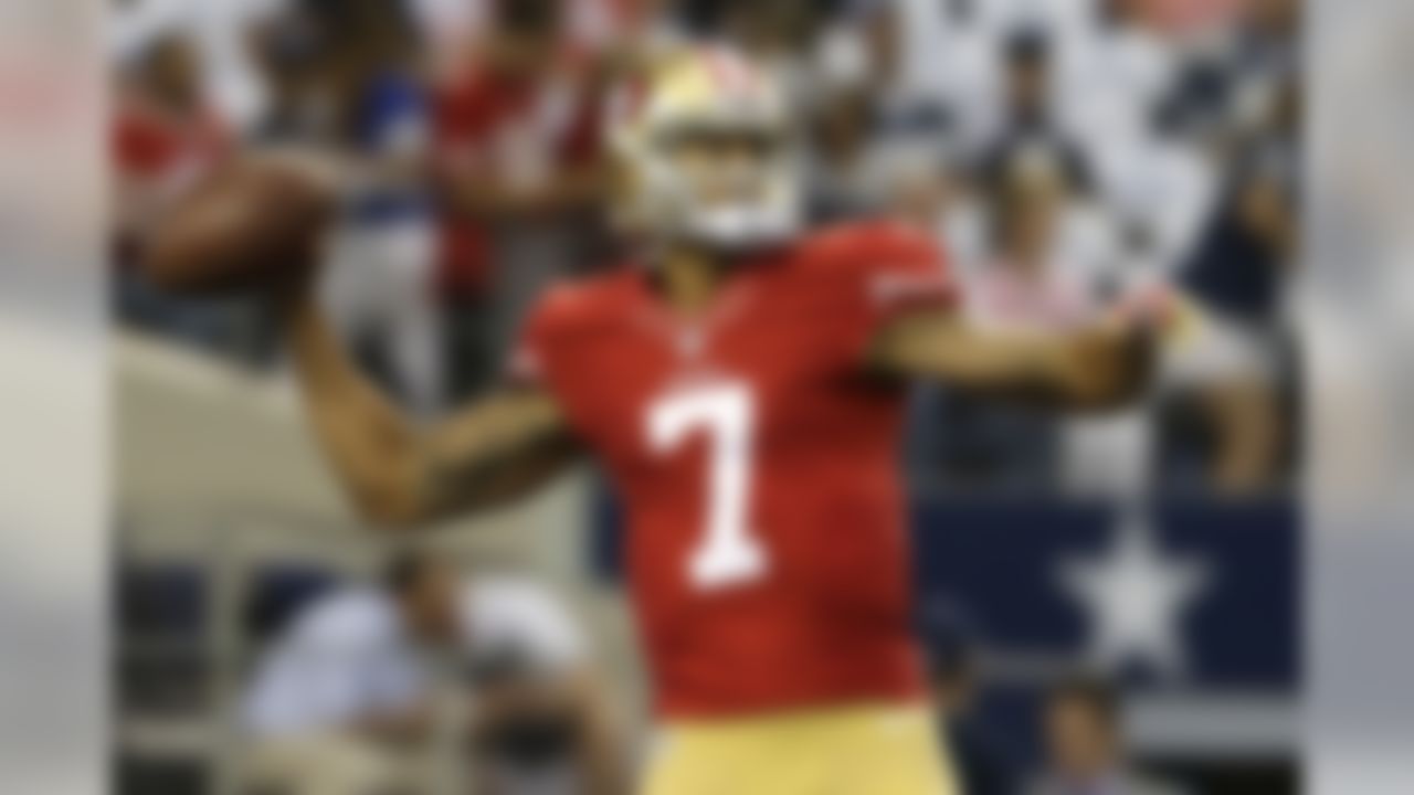 San Francisco 49ers quarterback Colin Kaepernick warms up before an NFL football game against the Dallas Cowboys, Sunday, Sept. 7, 2014, in Arlington, Texas. (AP Photo/LM Otero)