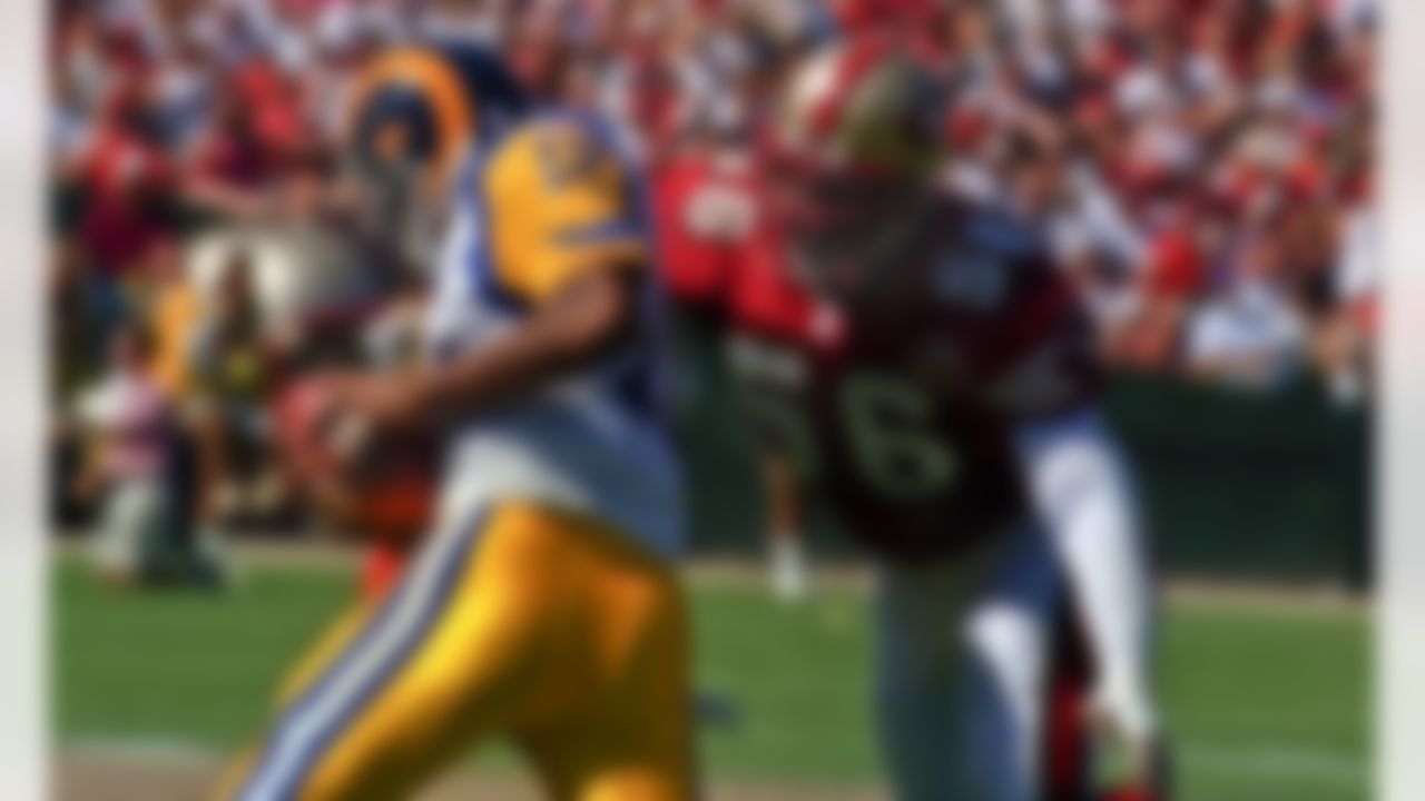 San Francisco 49ers vs. St. Louis Rams at Candlestick Park Sunday, September 8, 1996. 49ers beat Rams 34-0. San Francisco 49ers linebacker Chris Doleman (56) sacks St. Louis Rams quarterback Tony Banks (12). (AP Photo/Al Golub)