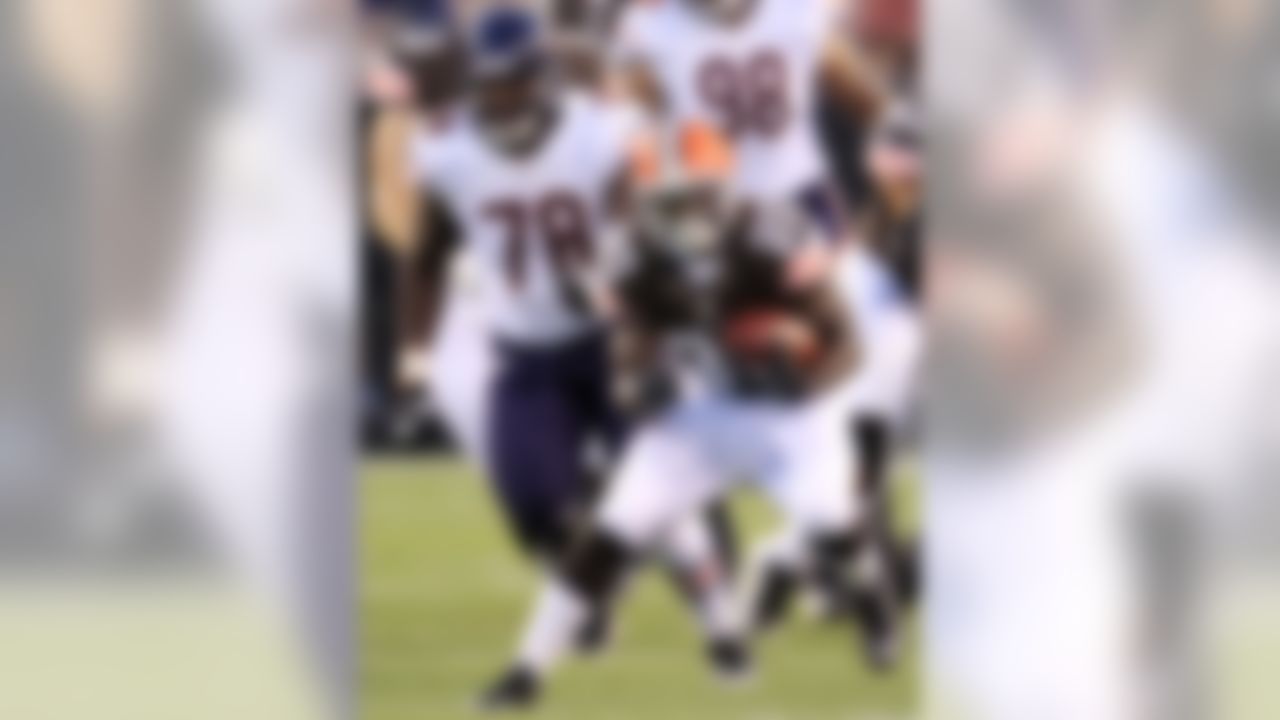 Chicago Bears tackle James Brown (78) pursues Cleveland Browns running back Montario Hardesty during the first half of a preseason NFL football game, Thursday, Aug. 30, 2012, in Cleveland. (AP Photo/Tony Dejak)