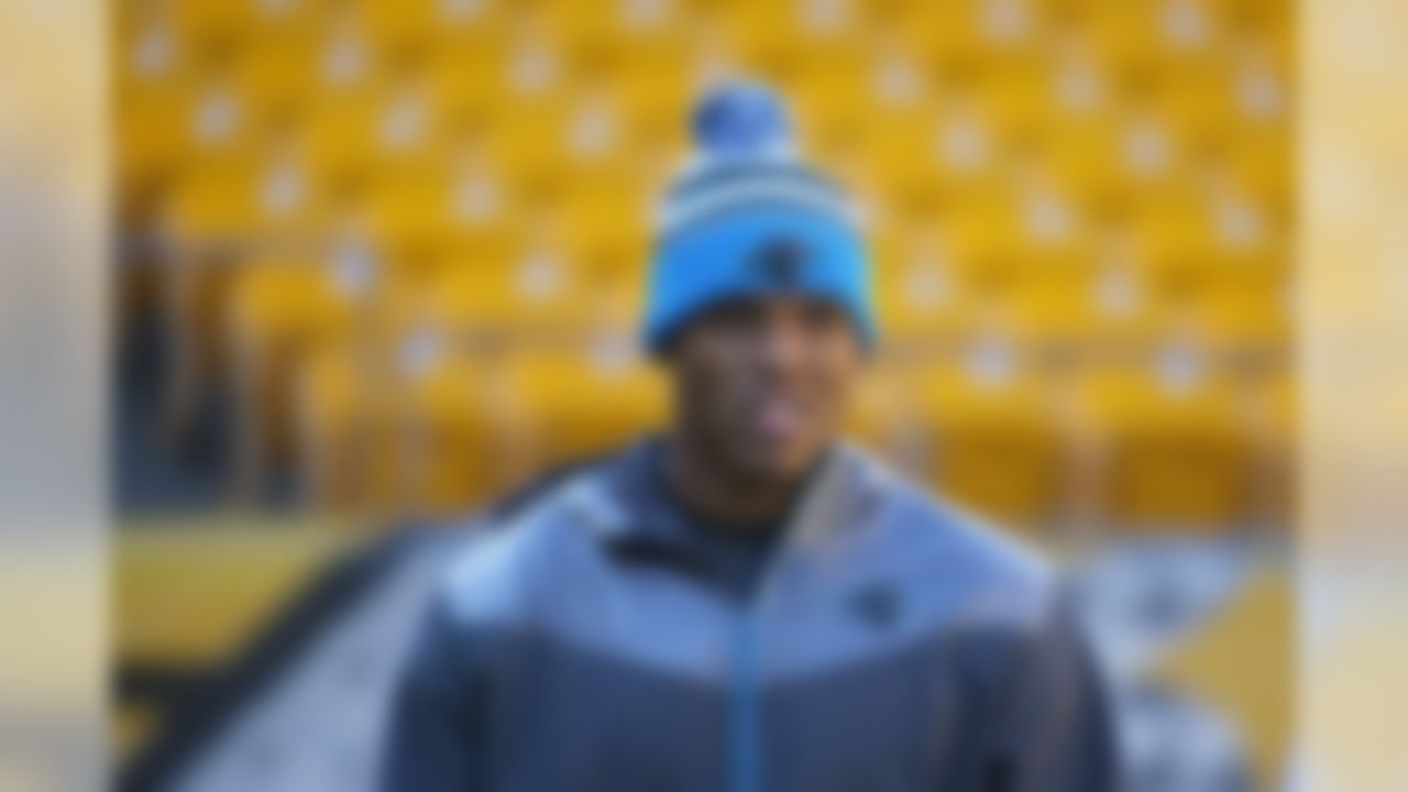 Carolina Panthers quarterback Cam Newton (1) walks around the edge of the field during warmup before the NFL preseason football game against the Pittsburgh Steelers Thursday, Aug. 28, 2014, in Pittsburgh. (AP Photo/Keith Srakocic)