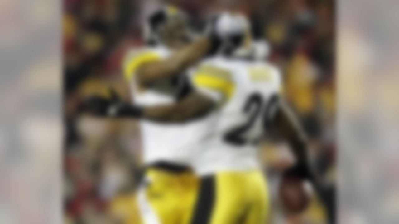 Pittsburgh Steelers defensive back Ryan Mundy (29) celebrates an interception with teammate Ryan Clark (25) during the first half of an NFL football game against the Kansas City Chiefs in Kansas City, Mo., Sunday, Nov. 27, 2011. (AP Photo/Charlie Riedel)