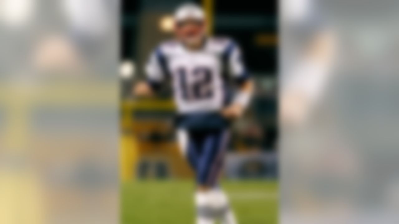 New England Patriots quarterback Tom Brady (12) celebrates a touchdown against the Pittsburgh Steelers at Heinz Field in Pittsburgh, Pennsylvania on November 14, 2010. (Joe Robbins/NFL)