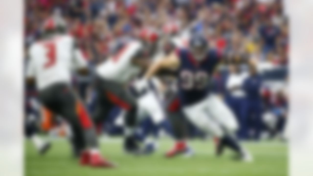 Houston Texans defensive end J. J. Watt (99) rushes toward the quarterback during a Week 3 NFL game against the Tampa Bay Buccaneers on Sunday, Sept. 27, 2015, in Houston. The Texans won the game 19-9. (Matt Patterson via AP)