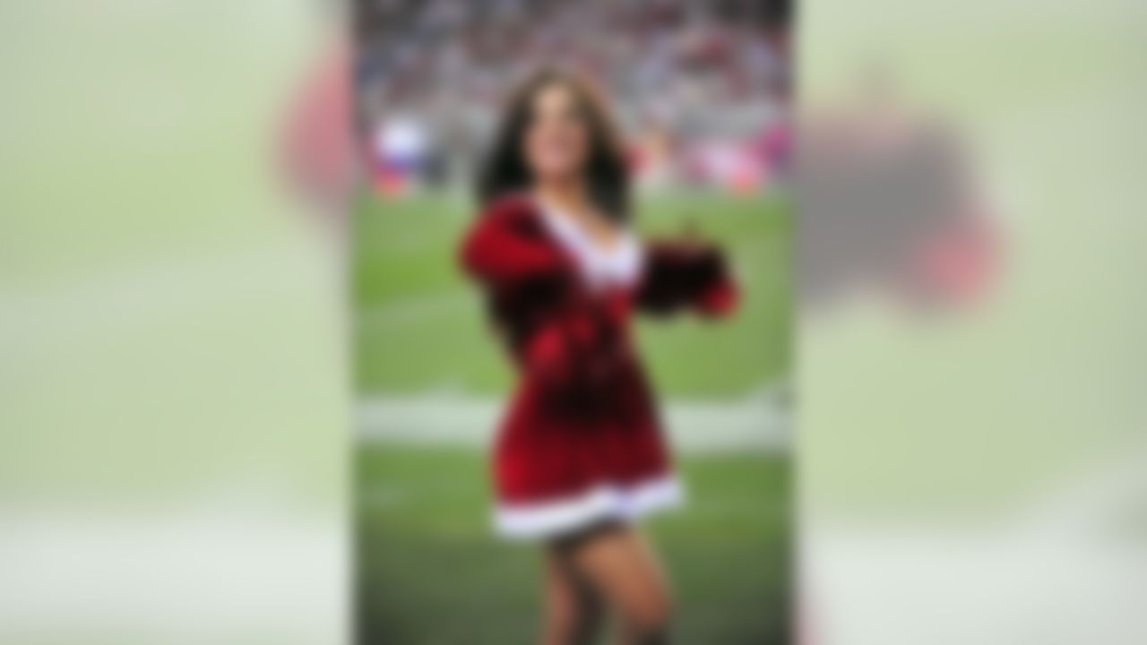 An Arizona Cardinals cheerleader performs during a game against the Dallas Cowboys at University of Phoenix Stadium in Glendale, Arizona on December 25, 2010. (Gary A. Vasquez/NFL)