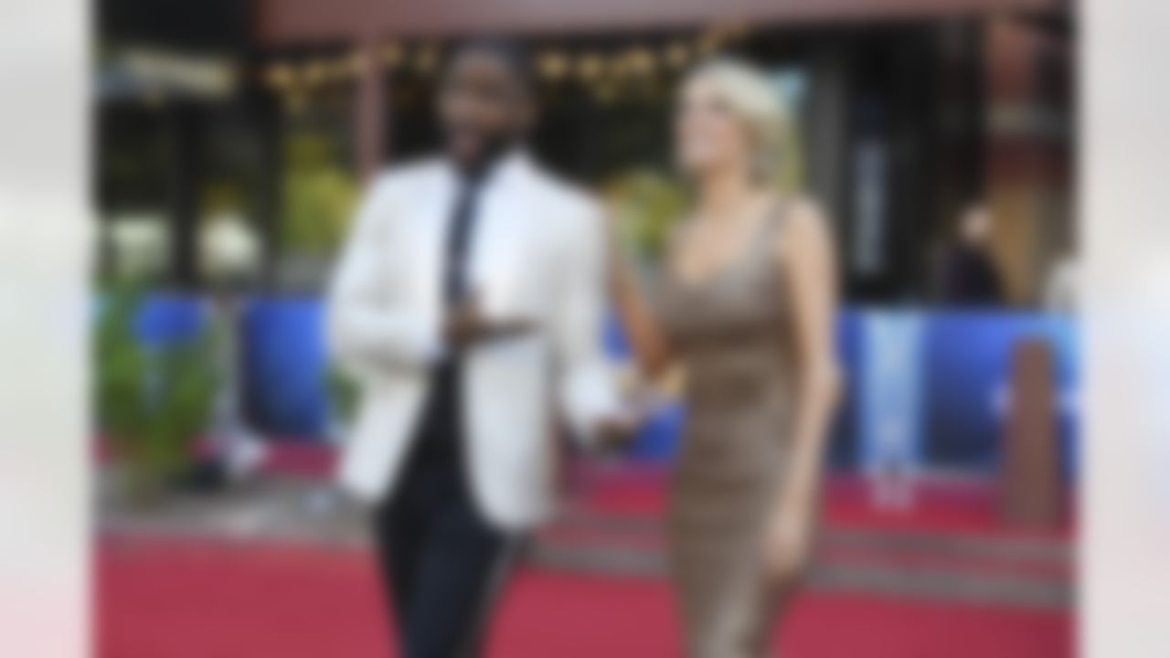 Nate Burleson and Melissa Stark arrive at the NFL Honors awards show on Thursday, February 9, 2023 in Phoenix, Arizona.