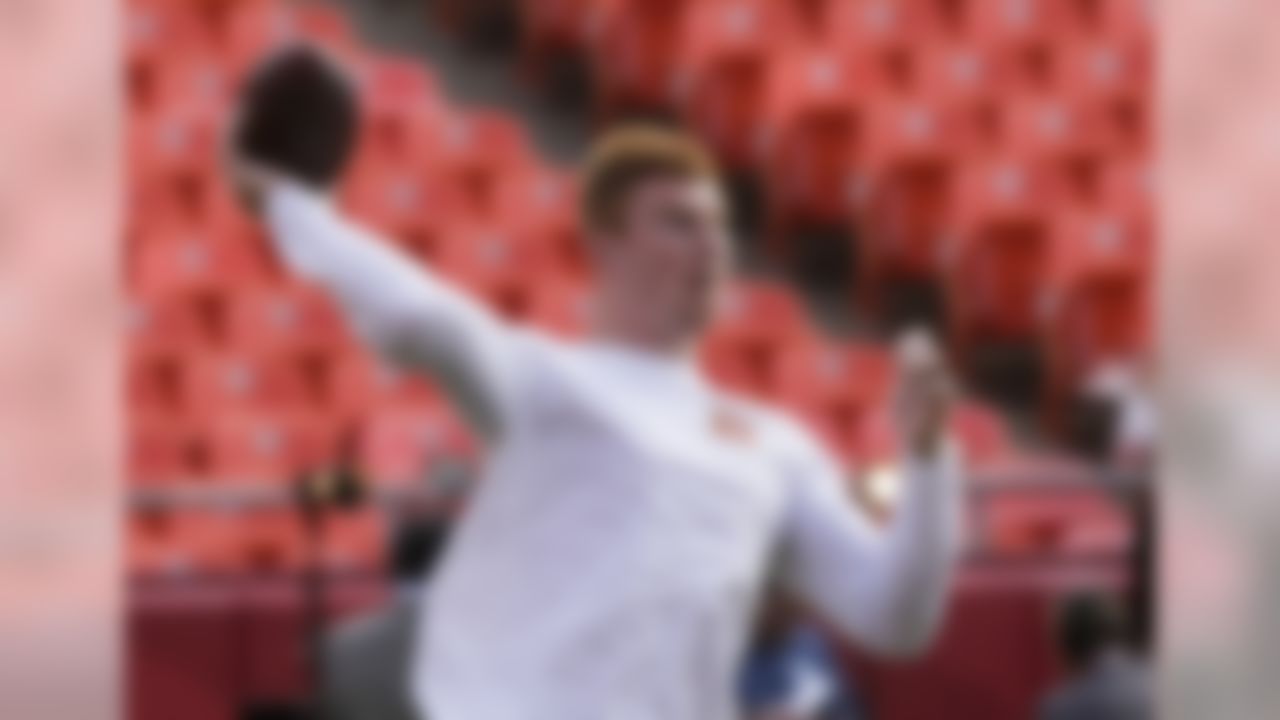 Cincinnati Bengals quarterback Andy Dalton warms up before an NFL preseason game against the Cincinnati Bengals on Thursday, Aug. 7, 2014, in Kansas City, Mo. (AP Photo/Kiichiro Sato)