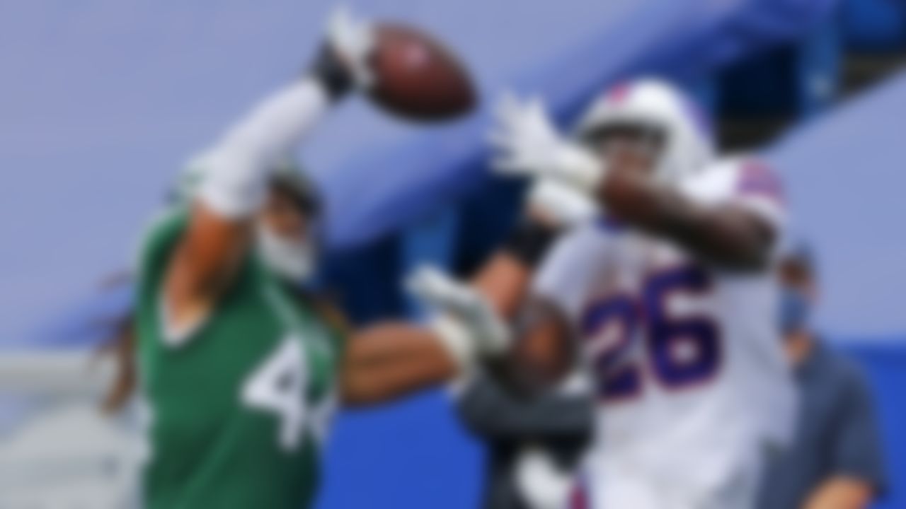 New York Jets linebacker Harvey Langi (44) breaks up a pass intended for Buffalo Bills running back Devin Singletary (26) during the second half of an NFL football game in Orchard Park, N.Y., Sunday, Sept. 13, 2020.